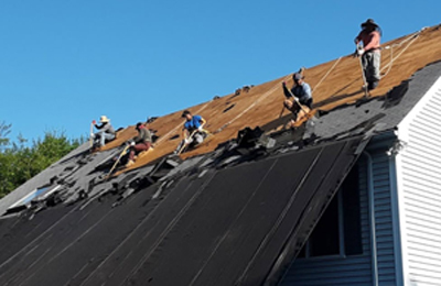 Roofers on a roof.
